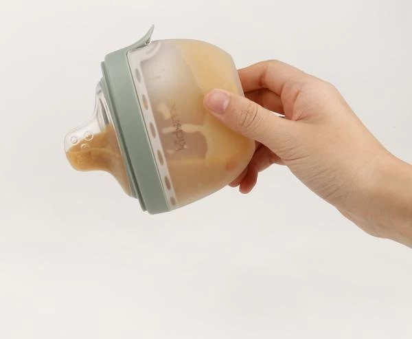 KIDSME Oval Feeding Bottle With Extra Nipple Green 3 KIDSME Oval Feeding Bottle With Extra Nipple Green - Image 3